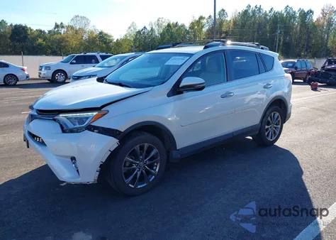 2018 Toyota Rav4 Limited z USA, uszkodzony, nr VIN JTMYFREV6JJ730453